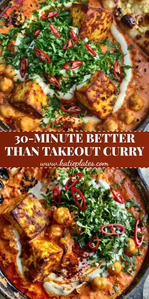 Indian Cuisine: Creamy Paneer and Chickpea Curry with Charred Garlic Naan 4 A top-down view of a rustic cast iron skillet containing orange-red paneer and chickpea curry garnished with cream swirls, red chilies, and cilantro. (Indian cuisine)